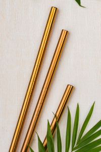 Metal reusable straws with green leaf.