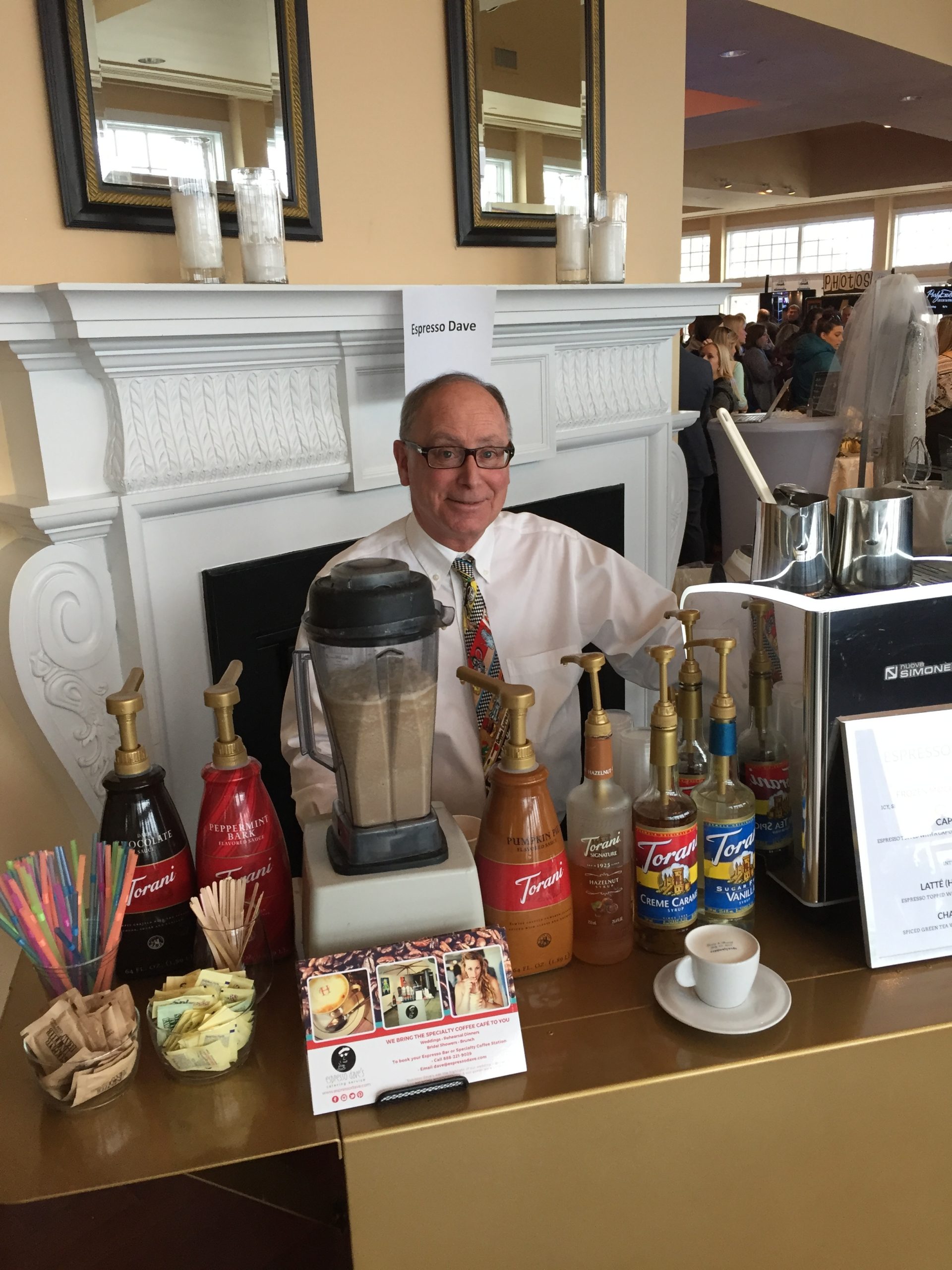 Barista, Espresso Dave, manning his coffee cart at a wedding show